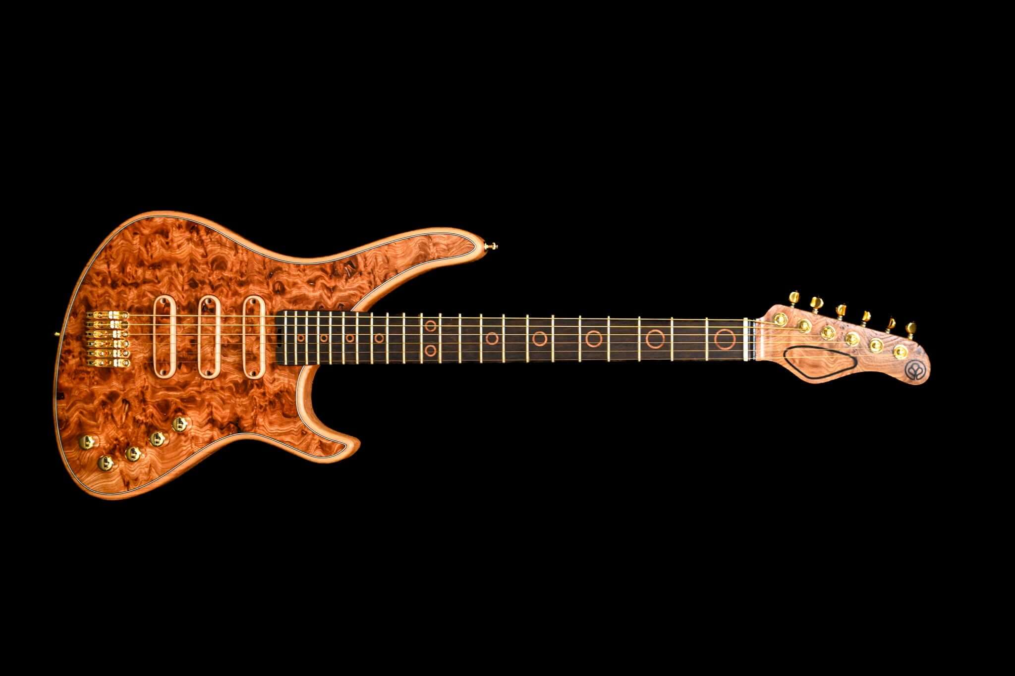 A horizontal front view of the Belforti S5 Elm Burl, showcasing the exceptional crafstmanship of the french brand
