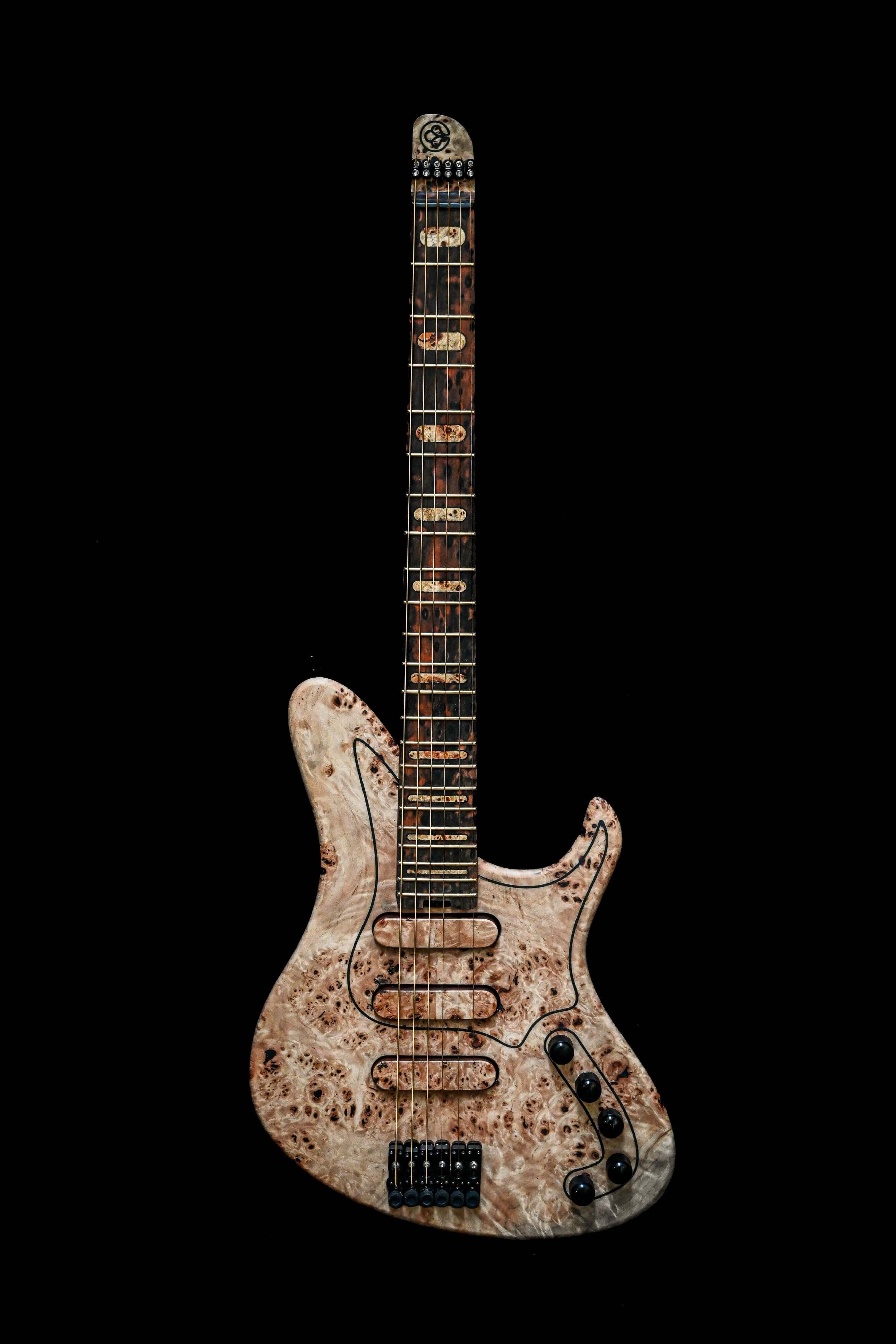 Sarā 6HL SC - Masterbuilt, custom boutique electric guitar by Belforti, high-end design with unique tonewoods on black background.
