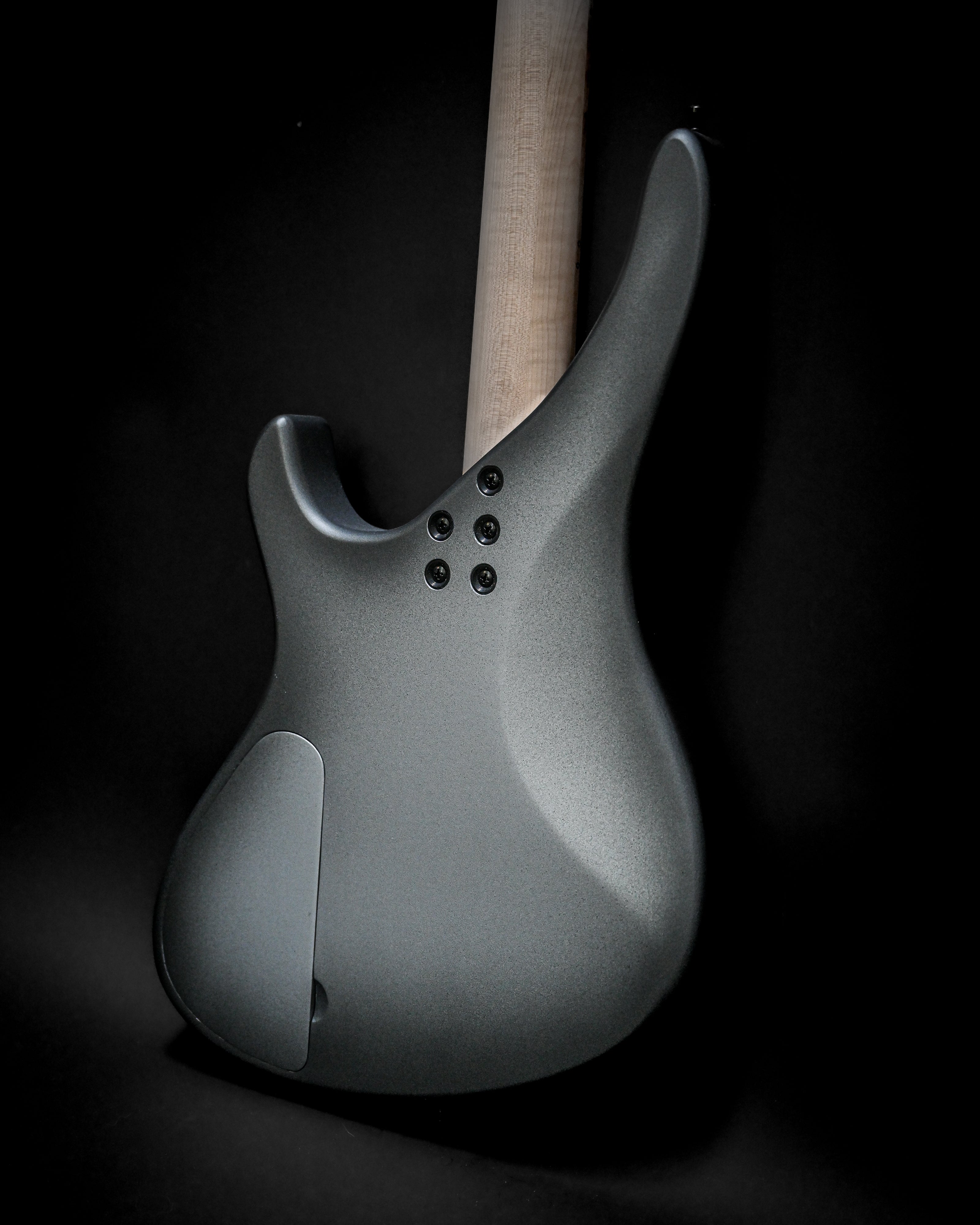 Back view of Sarā 6 - Essential custom electric guitar in grey finish showcasing the sleek design and reliable hardware.