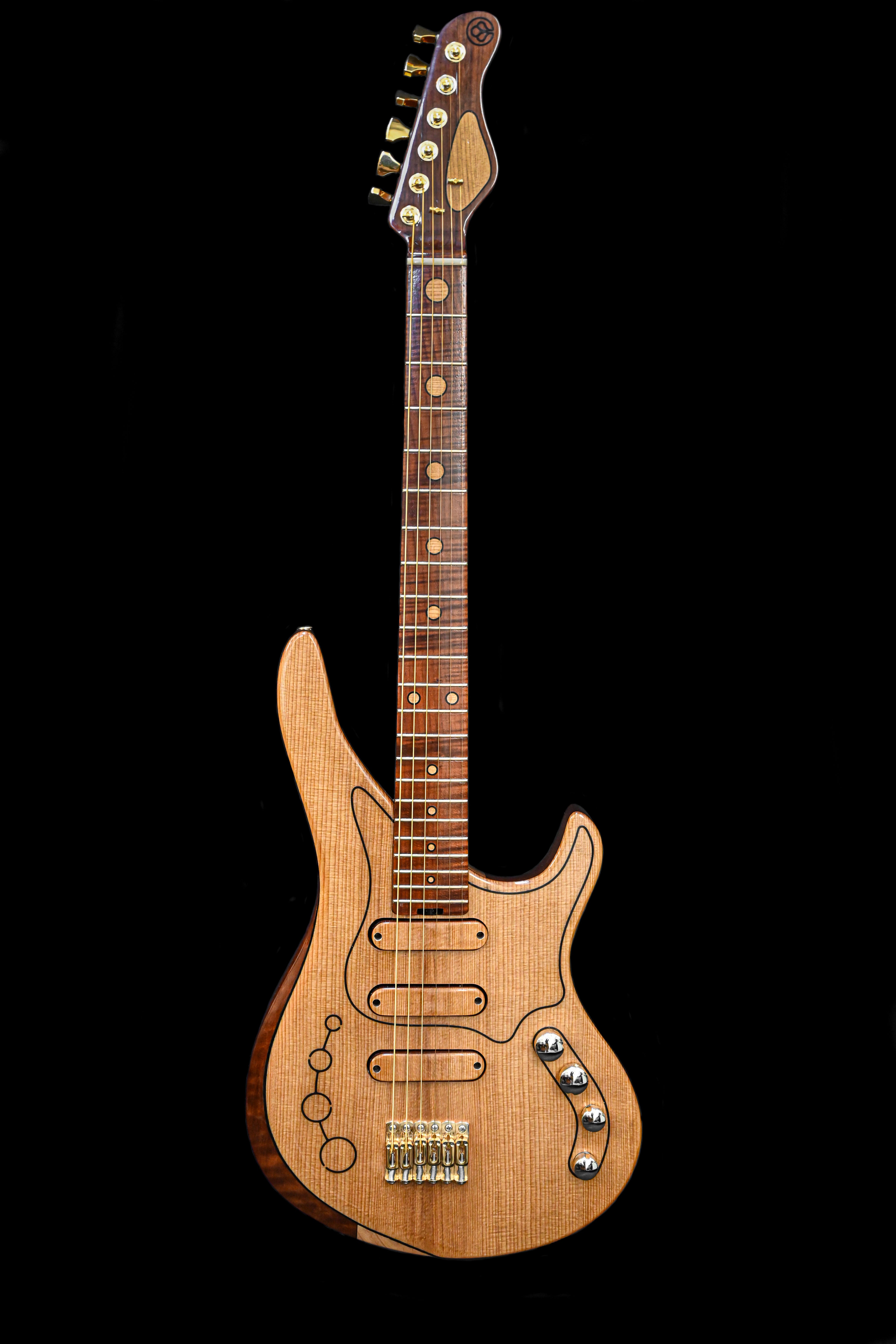 M-Series Guitar by Belforti Instruments, showcasing a unique design with a natural wood finish and intricate detailing on the body and fingerboard.