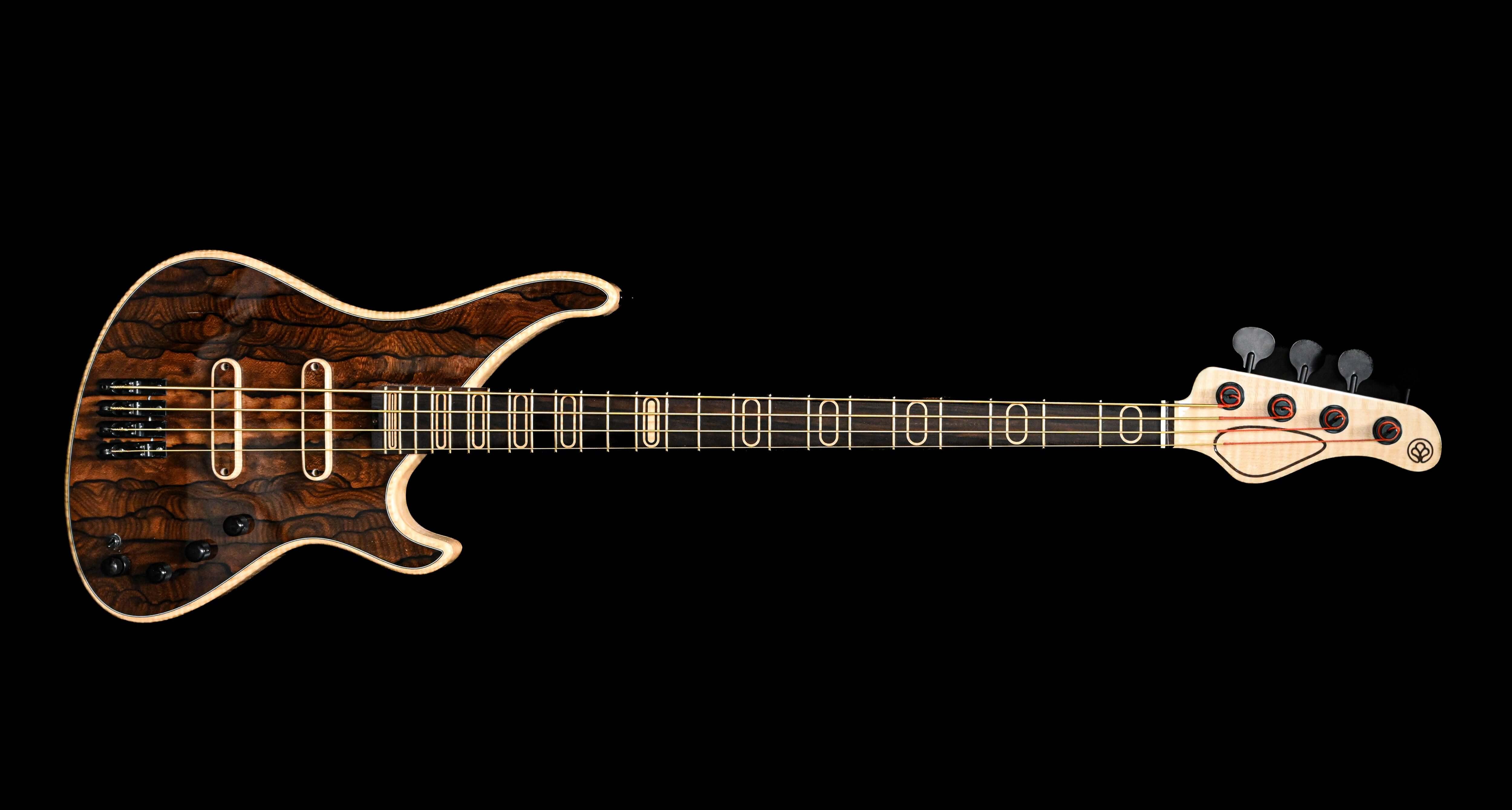 Belforti S1 4 strings electric bass with a Ziricote Top, matching inlays