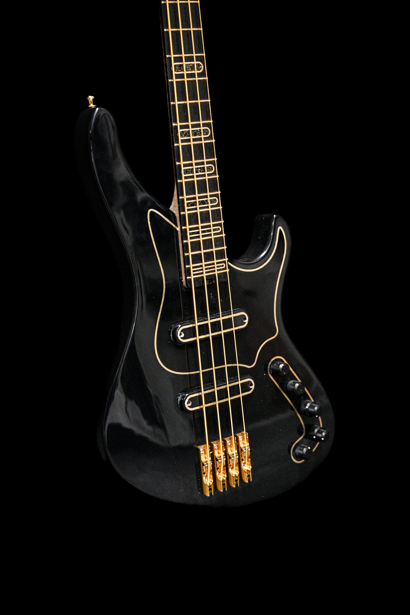 Macro shot of the S1 'Laudate Concordia' Limited Edition bass guitar's fretboard and inlays.