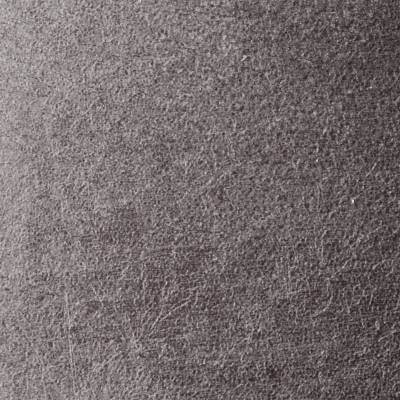 Primer plano de la superficie de tela gris texturizada