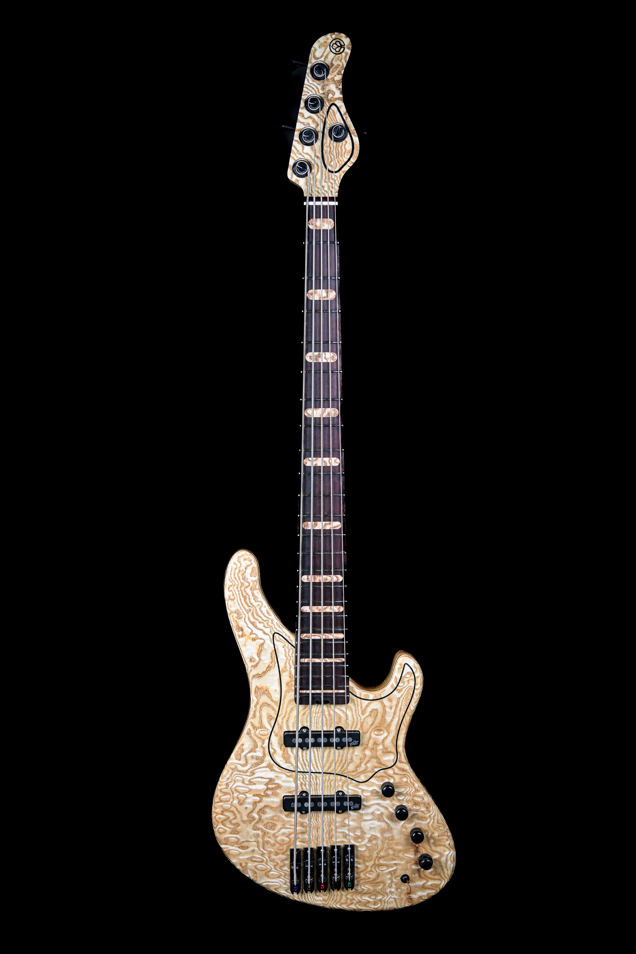 Marē 5 - Masterbuilt high end bass guitar by Belforti, showcasing custom boutique craftsmanship.