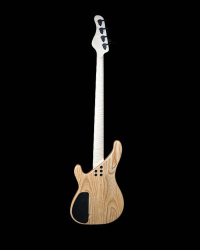 Rear view of the Vēa 4 - Essential bass guitar by Belforti, showcasing boutique custom design with high-end luxury features.
