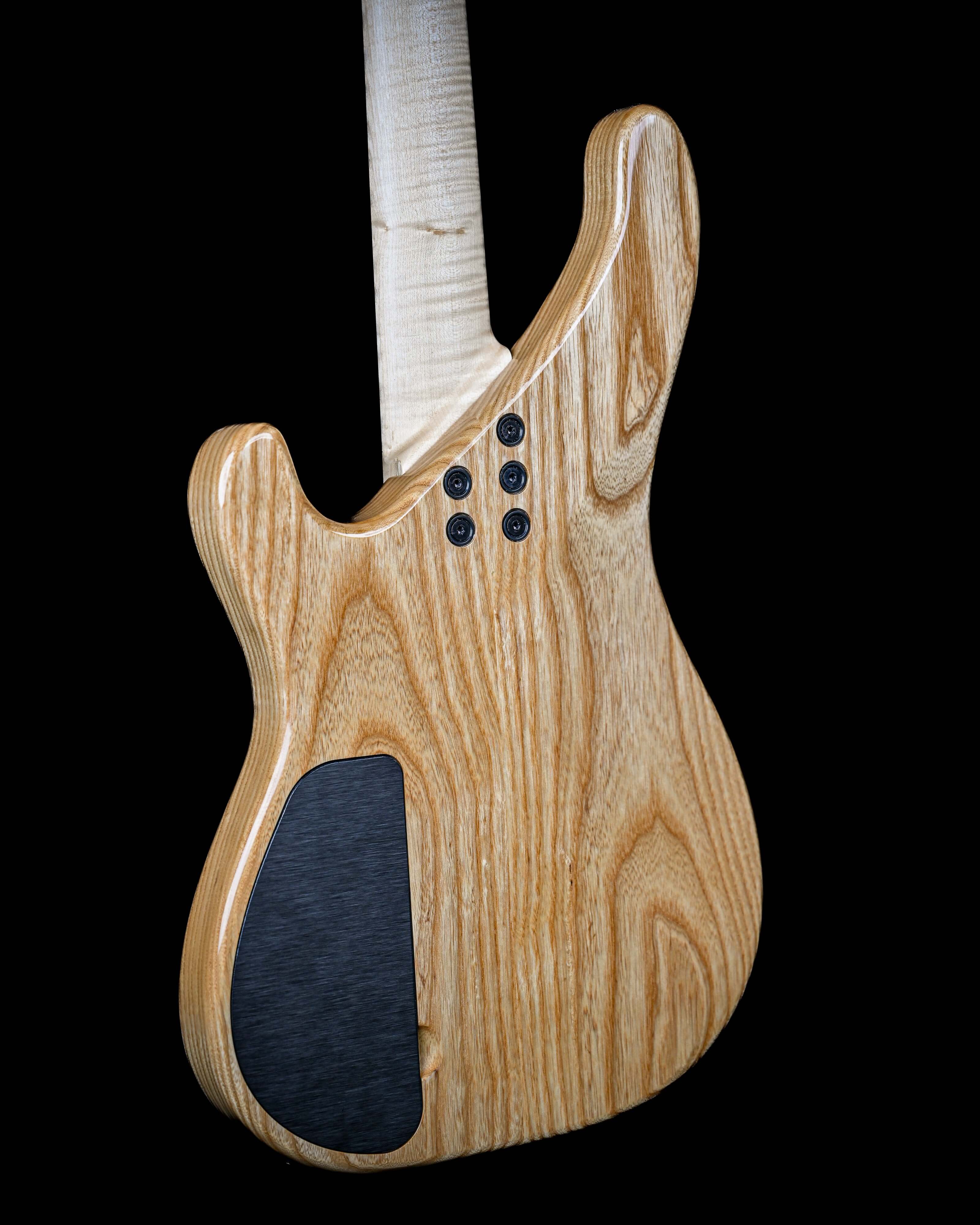 Vēa 4 - Essential back view, Belforti custom high-end luxury boutique bass guitar showcasing tonewoods and design simplicity.