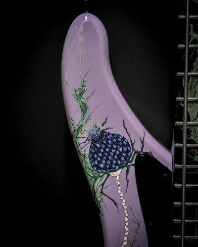 Custom artwork on Vēa 5 - Essential bass guitar by Belforti, featuring high-end luxury design with a purple finish and intricate details.