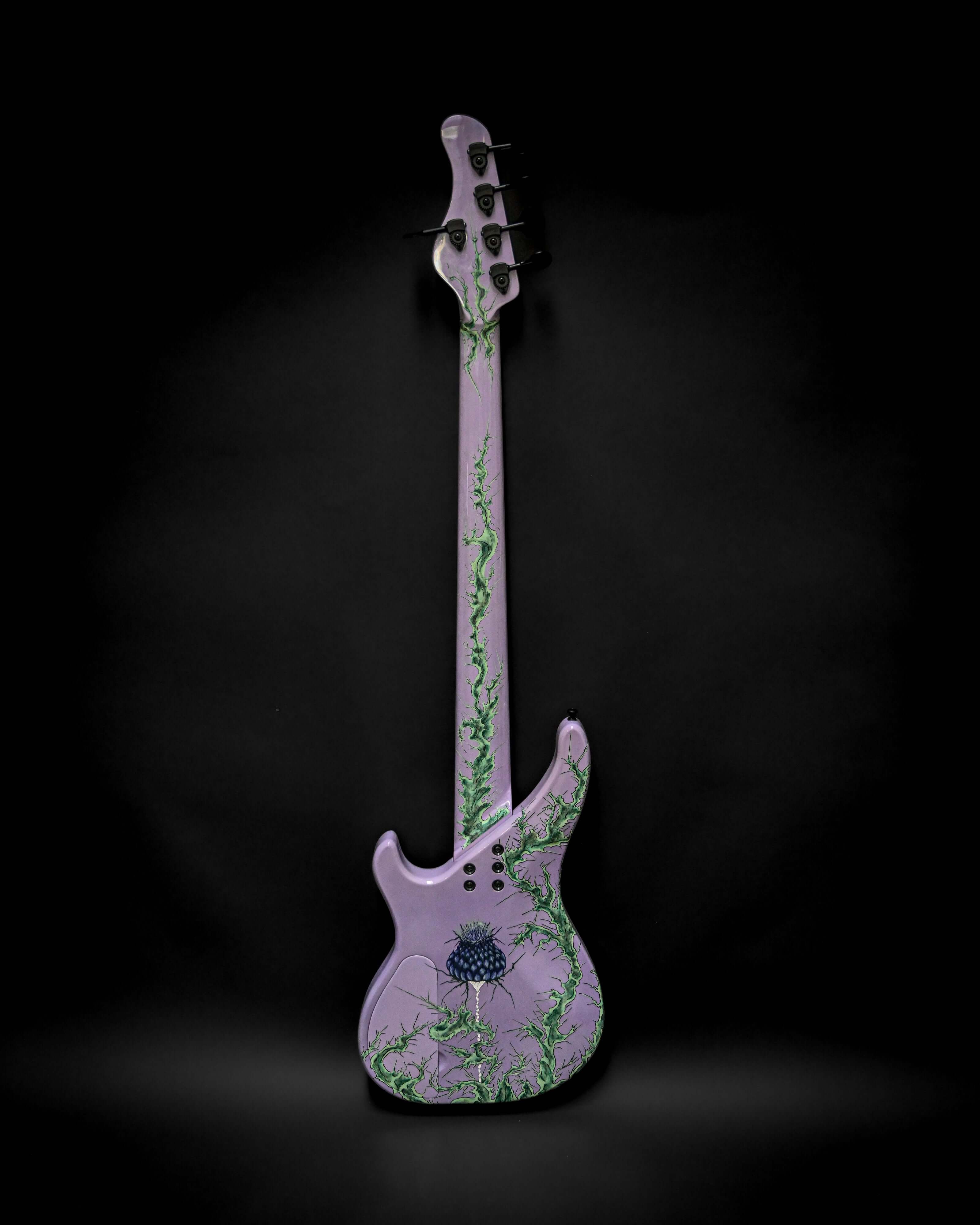 Vēa 5 - Essential luxury bass guitar by Belforti, a high-end custom boutique instrument with unique design.