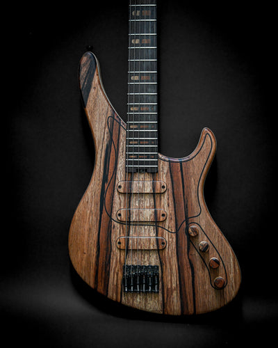 Sarā 6 - Masterbuilt custom electric guitar with a rich wood grain finish, designed for high performance and precision by Belforti.