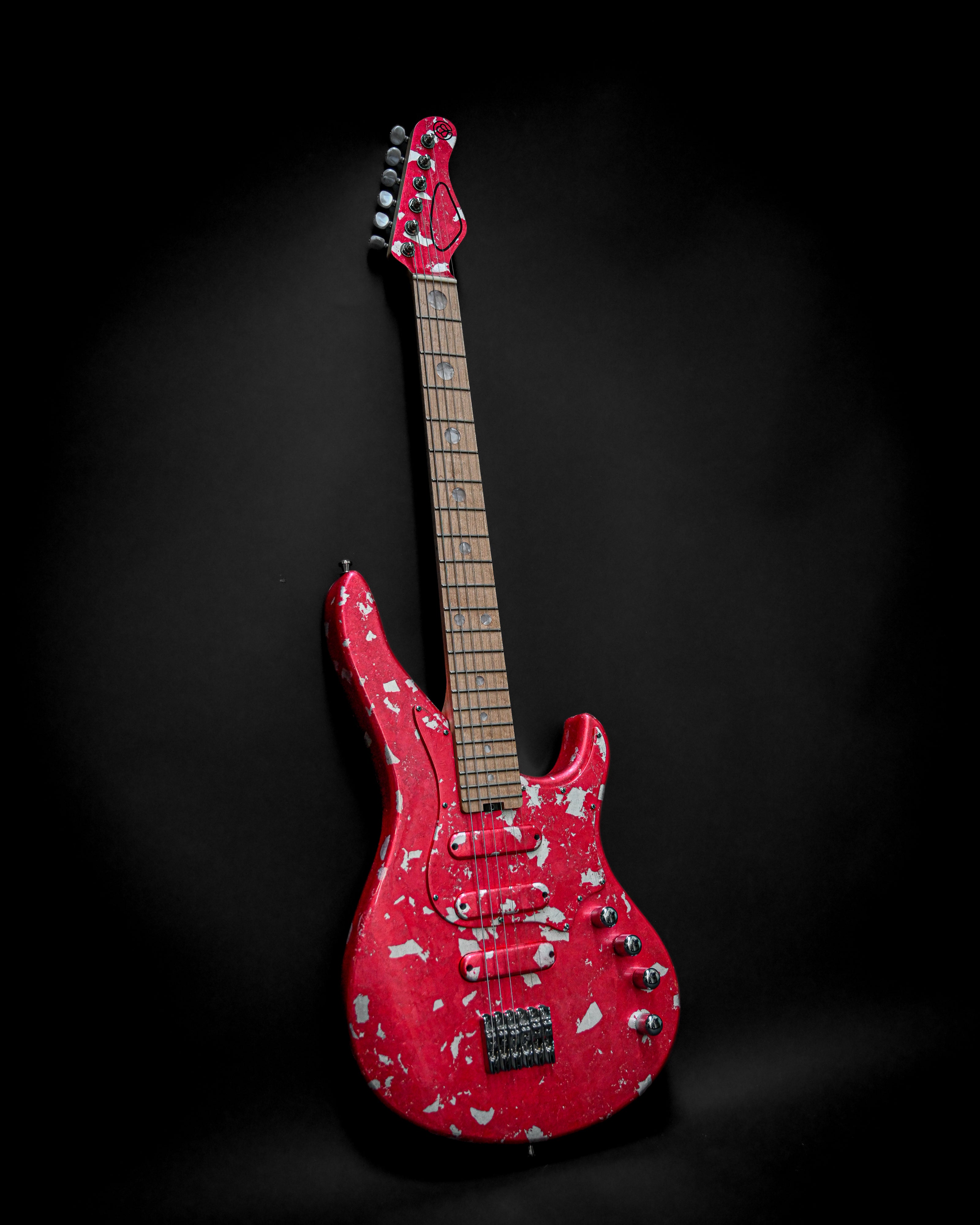 Yatē 6 - Essential - Kurenai custom electric guitar in vibrant red finish against black background.