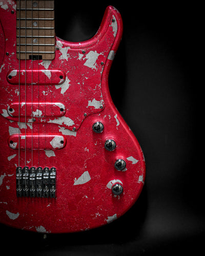 Custom electric guitar Yatē 6 - Essential - Kurenai in red with unique finish, part of Belforti’s Essential Series emphasizing quality and tone.