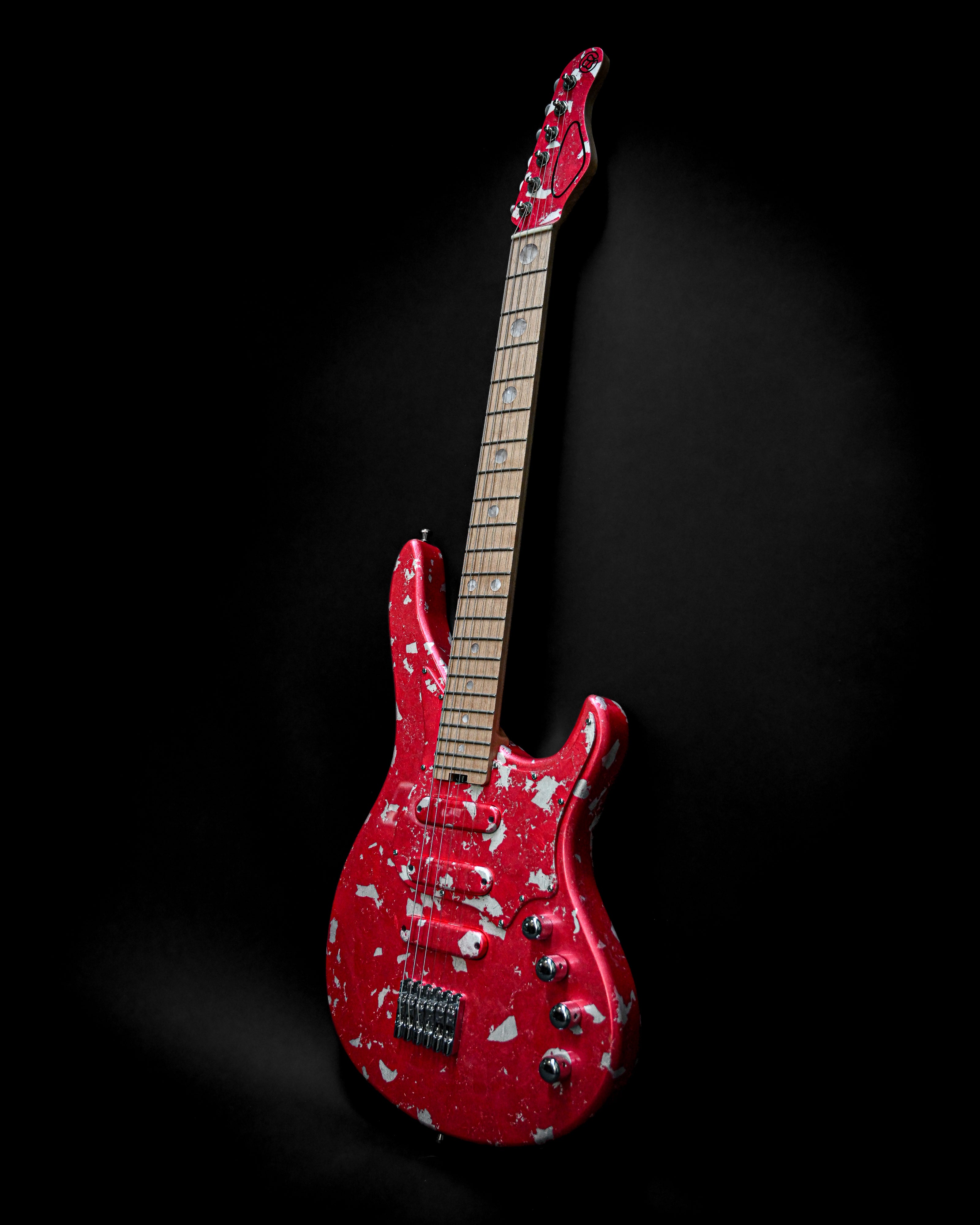 Red custom electric guitar - Yatē 6 - Essential - Kurenai model by Belforti, showcasing simplicity and professional-grade tone.