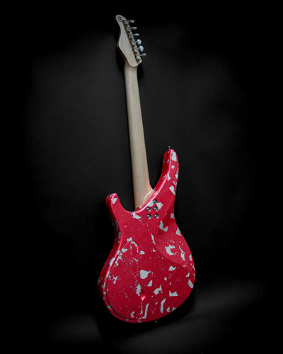 Yatē 6 - Essential - Kurenai custom electric guitar back view showcasing unique red finish and streamlined design.