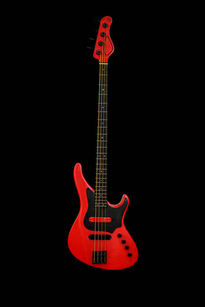 Full view of the E1 Normandy Apple Red bass guitar by Belforti Instruments, showcasing its vibrant red finish and sleek design against a black background.