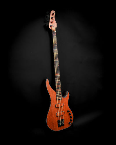 S3 Lacewood electric bass guitar, captured from a dynamic perspective to highlight its unique features.