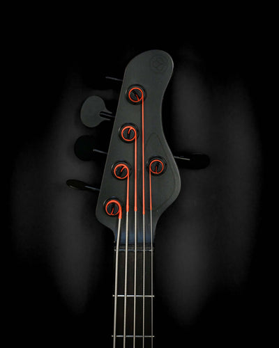 Vēa 5 - Essential by Belforti bass guitar headstock, representing simplicity, functionality, and premium build quality.