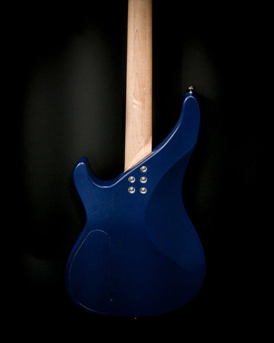 Back view of Vēa 4 - Essential bass guitar by Belforti in dark blue finish.