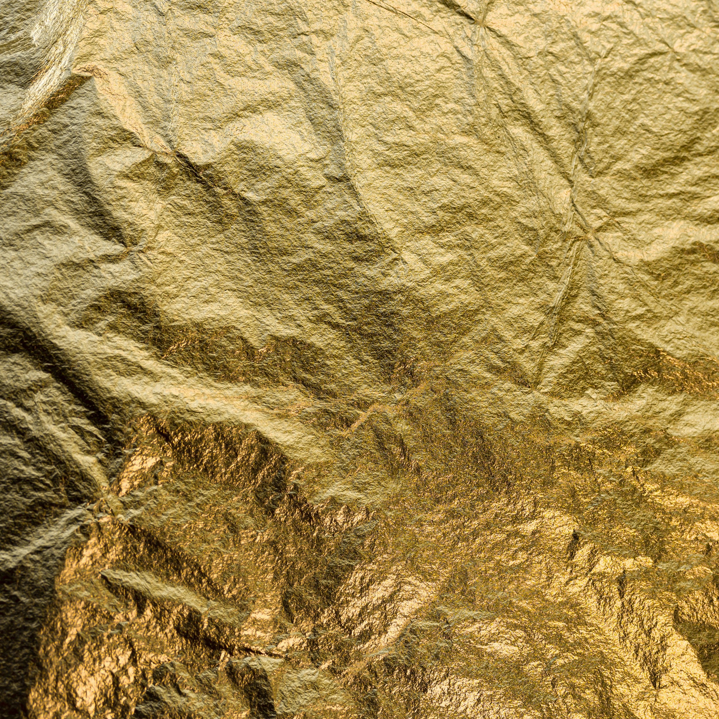A golden surface, with texture and fine gold 