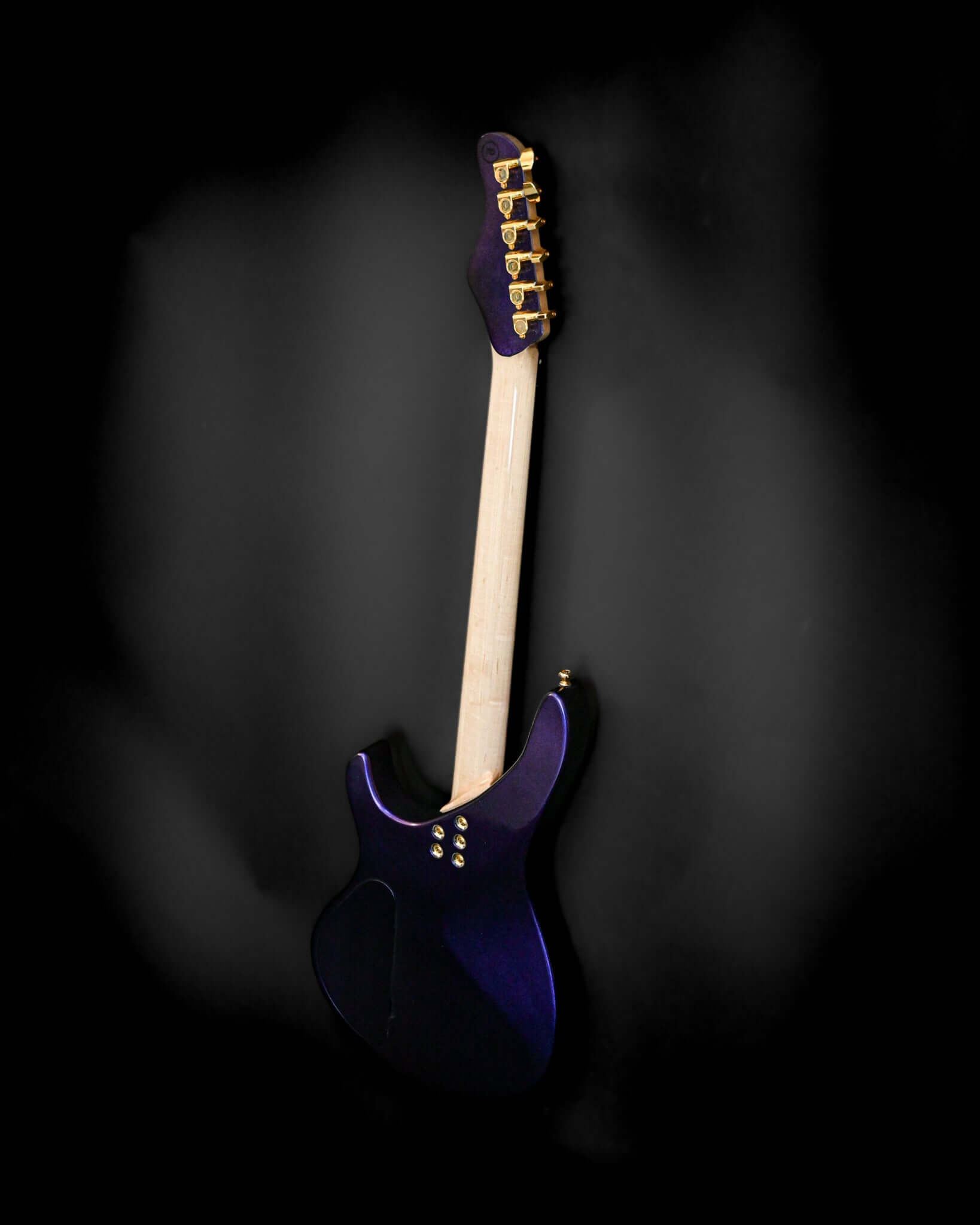 Back view of Belforti Yatē 6 - Essential bass guitar showcasing tonewoods and design.