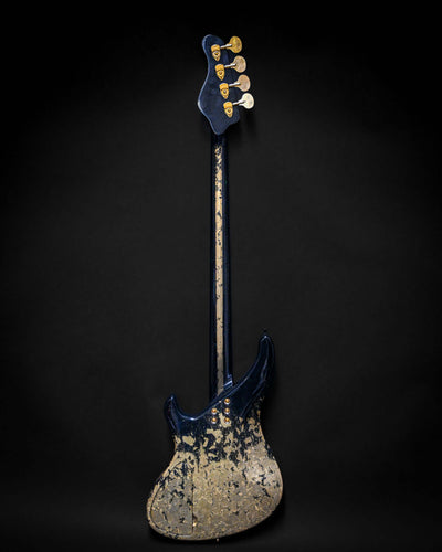 Rear view of Marē 4 - Essential bass guitar by Belforti, showcasing custom high-end luxury design with unique blue and gold finish.