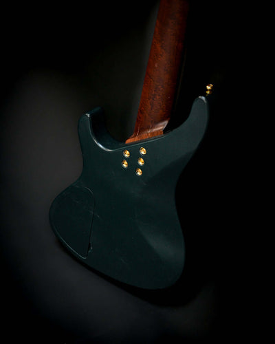 Back view of a Belforti Marē 5 - Essential bass guitar showcasing its sleek design and reliable hardware.