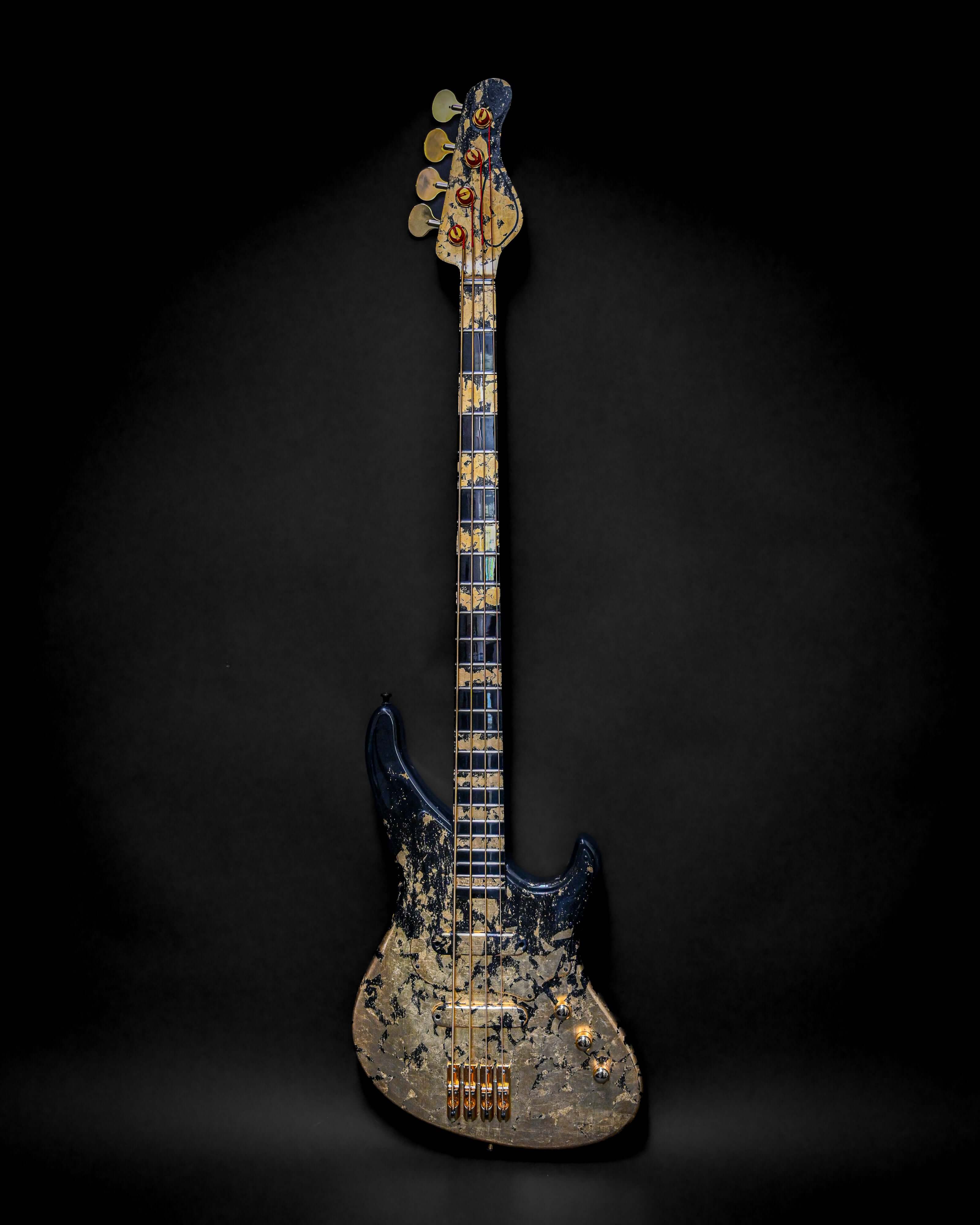 Marē 4 - Essential bass guitar by Belforti, custom boutique high-end luxury instrument with artistic finish, on black background.