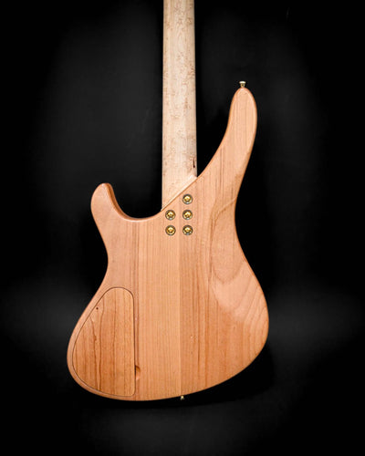 Vue arrière de la guitare Sarā 6 - Signature de Belforti Instruments, montrant les contours sculptés et la finition en bois noble.