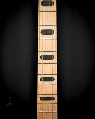 Close-up of Sarā 6 - Essential bass guitar neck by Belforti, showcasing tonewoods and craftsmanship of the Essential Series.