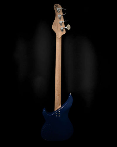 Back view of the Vēa 4 - Essential bass guitar by Belforti, showcasing its elegant and simple design tailored for professional use.