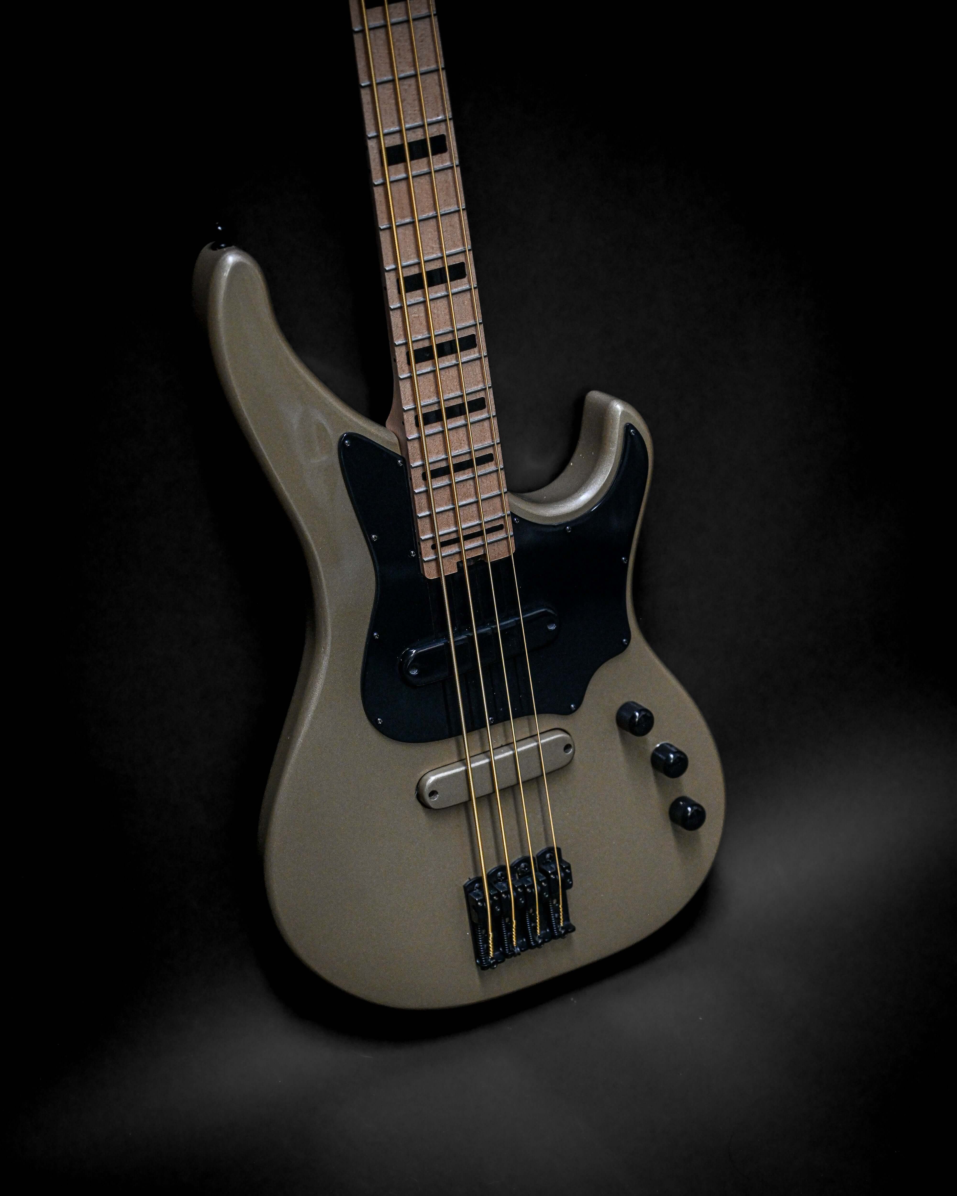 Vēa 4 - Essential bass guitar by Belforti with simplistic design and professional-grade features on display.