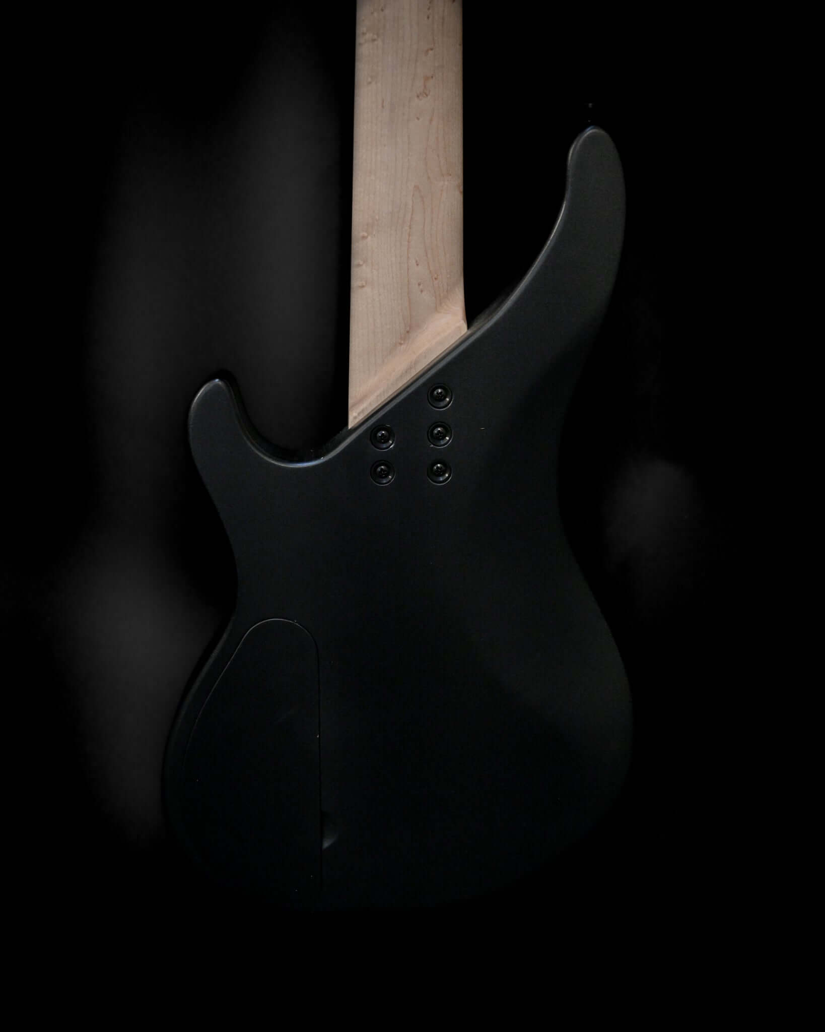 Back view of Belforti Vēa 5 - Essential bass guitar showing sleek design and craftsmanship.