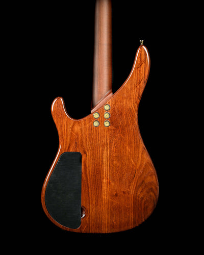 Back view of Yatē 6 - Masterbuilt boutique electric guitar by Belforti, showcasing custom design and high-end tonewood.