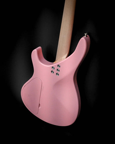Back view of Belforti Yatē 6 - Essential bass guitar in pink, highlighting its sleek design and craftsmanship.