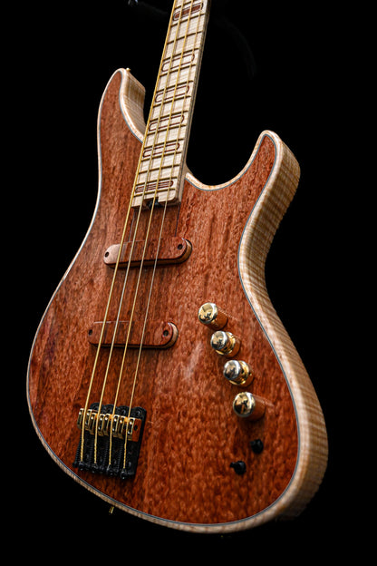 S1 Waterfall Bubinga 低音吉他俯视图，展示指板和木质材料的精美细节。